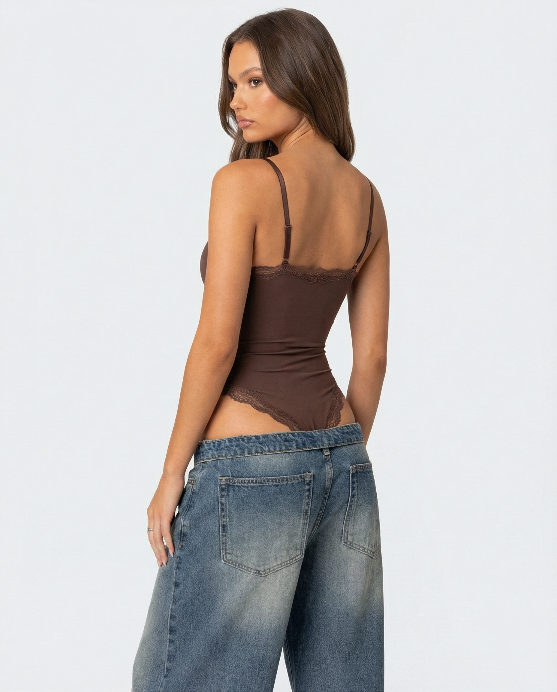 A single green leaf against a white background.