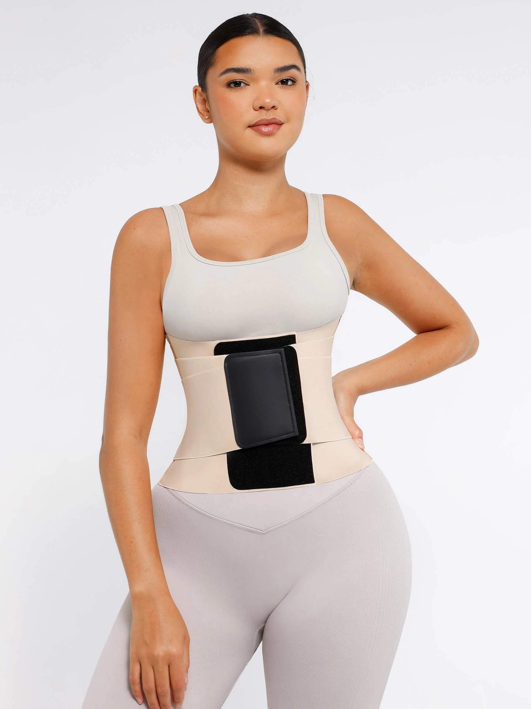 A single green leaf against a white background.